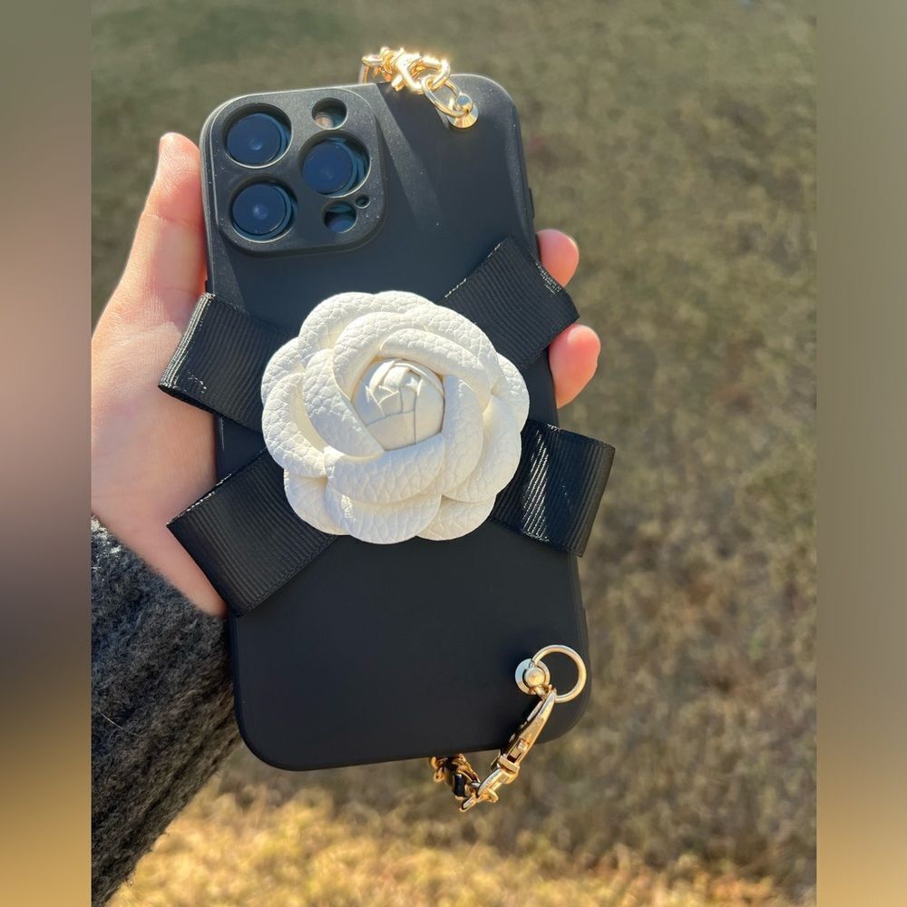 Elegant Chain Strap iPhone 16 Case with White Flower Accent - Picture 8 of 9